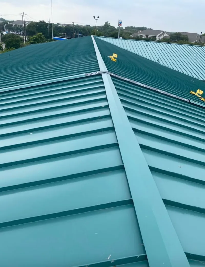 Green commercial metal roof ridge and valley for Metal Roof Repair in DeWitt