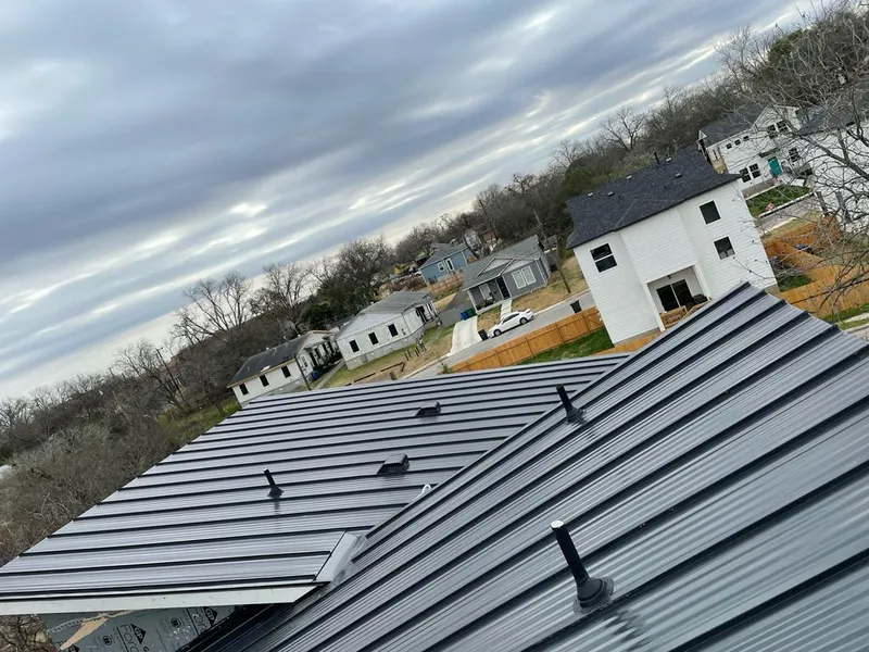 Standing seam metal roof panels with vents for Skylight Repair in DeWitt